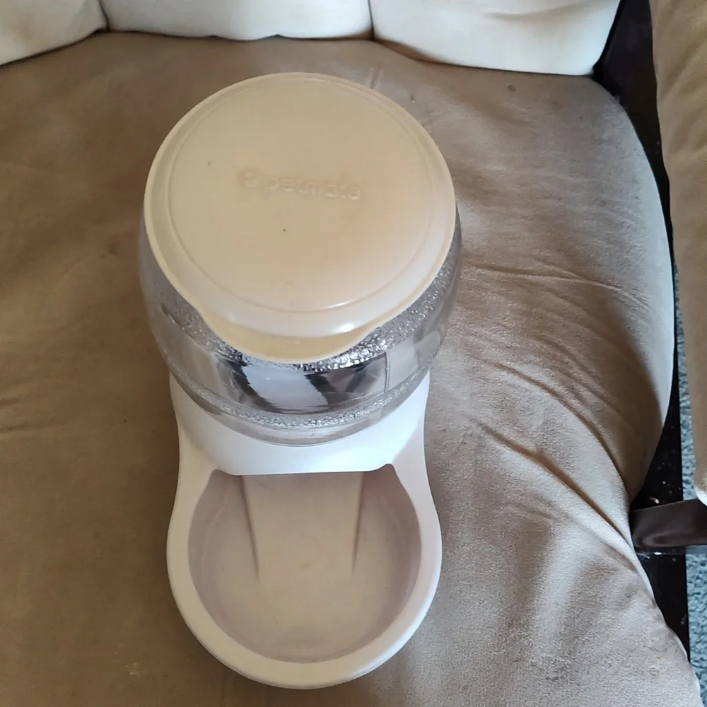 Petmate gravity feeder for small dog or cats.